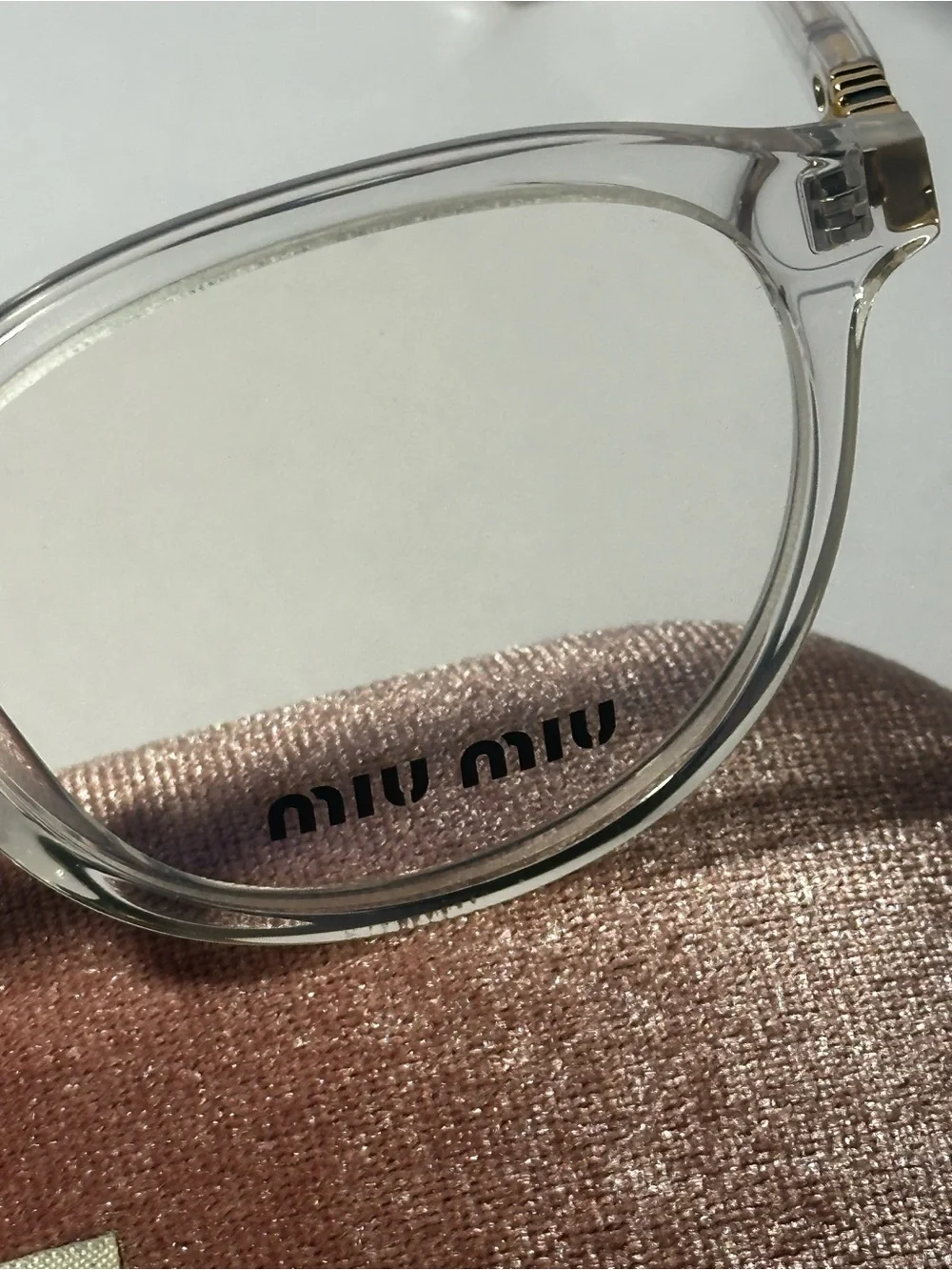 Miu Miu Clear Round Eyeglasses with Pink Velvet Case